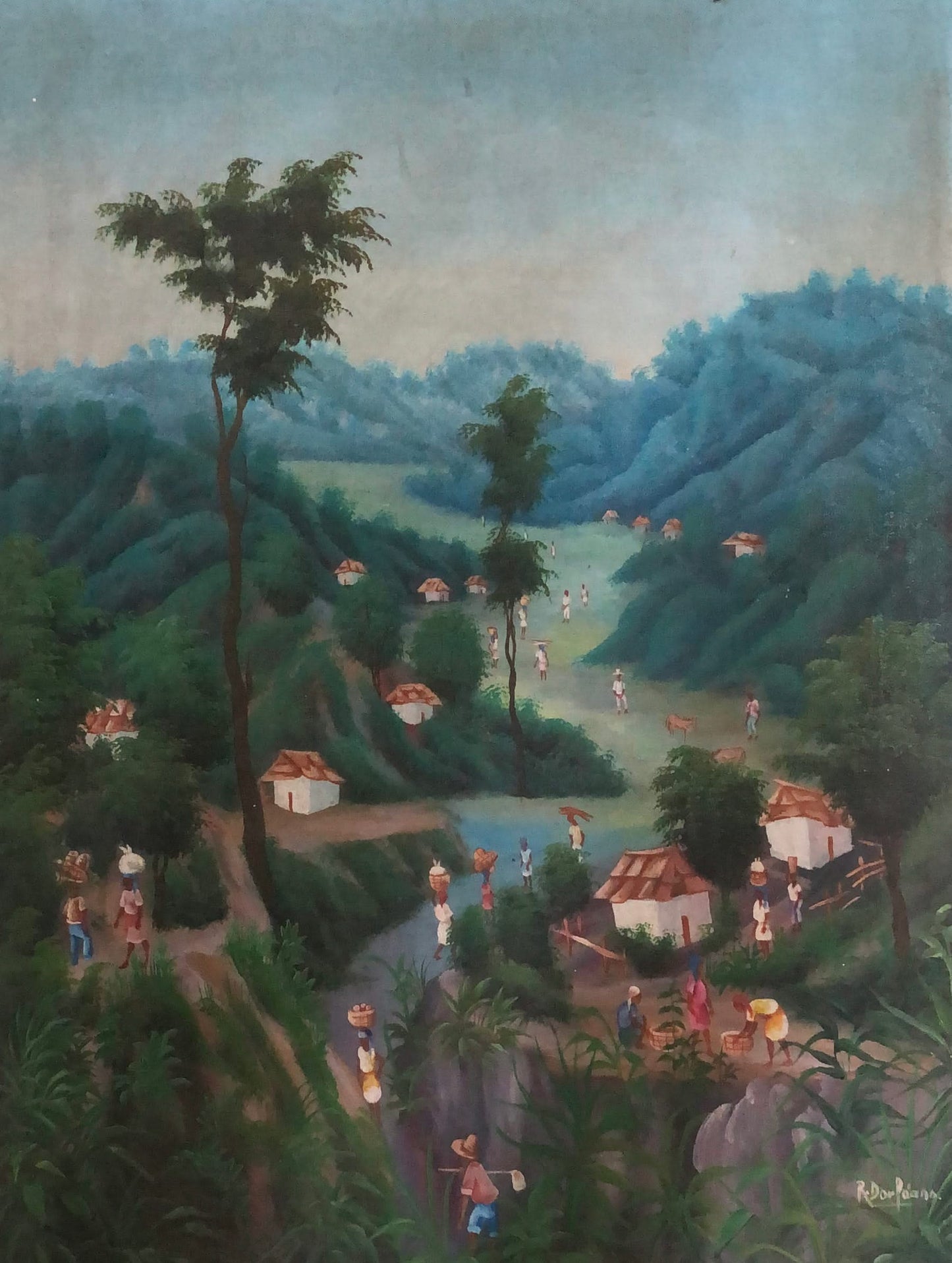 Village scene with houses and people in a lush green landscape