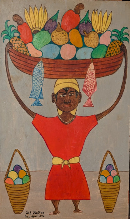 Seymour Bottex oil painting of a Haitian market woman balancing a basket of tropical fruit and fish on her head with two woven baskets at her sides 