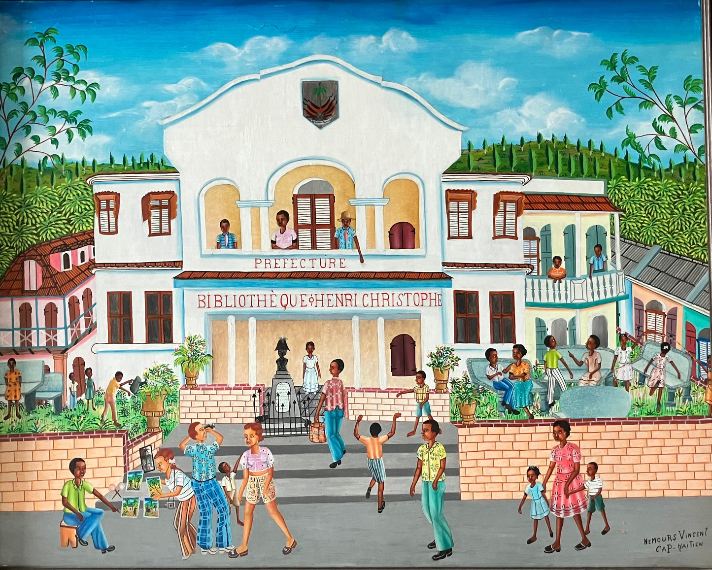Nemours Vincent Préfecture of Cap-Haïtien, original Haitian painting depicting the Préfecture and Bibliothèque Henri Christophe with townspeople in Cap-Haïtien, 24 × 30 inches. 