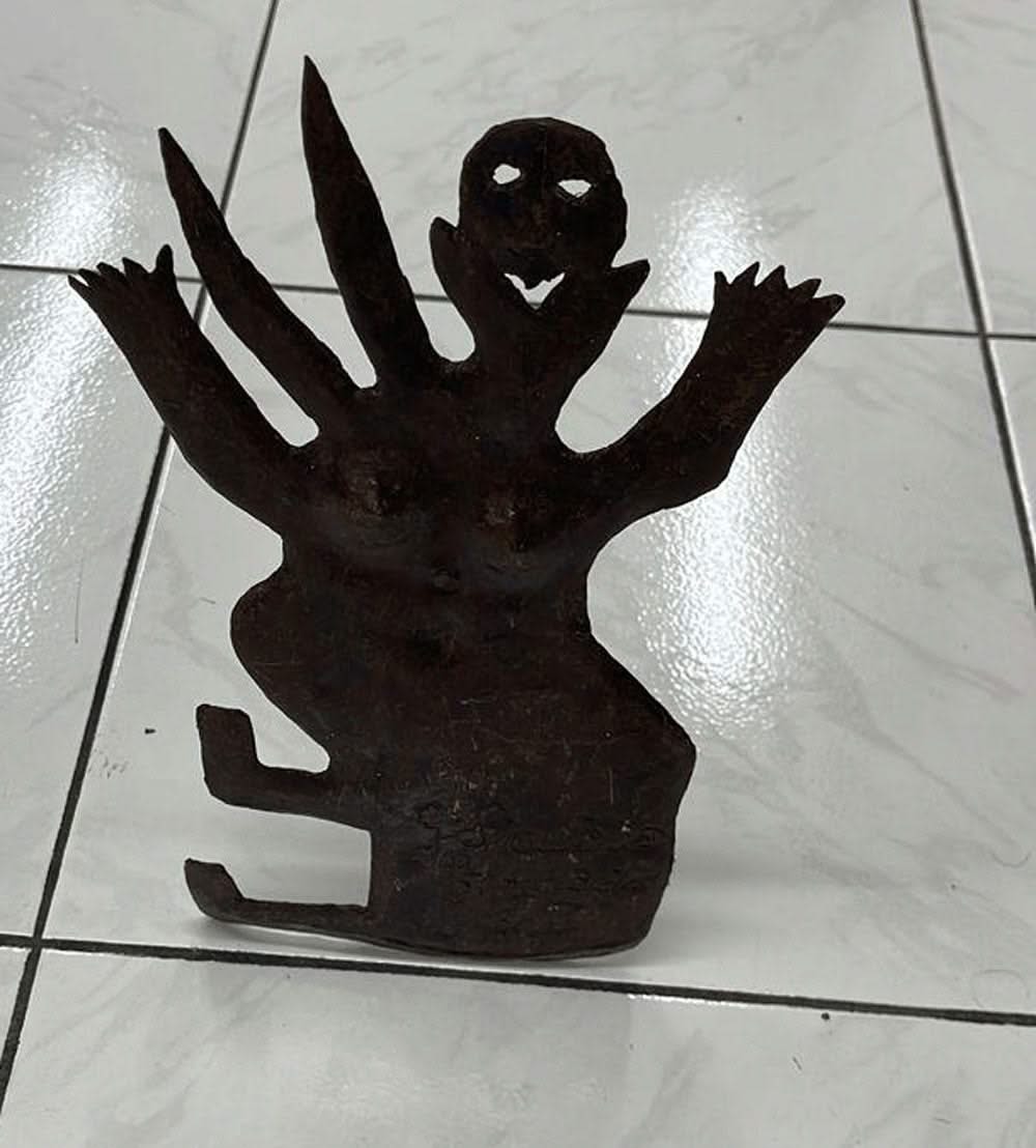 Georges Liautaud Man/Animal, original Haitian hand-cut steel sculpture depicting a hybrid human-animal figure, 11 × 7 inches.