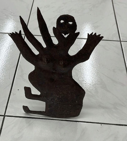 Georges Liautaud Man/Animal, original Haitian hand-cut steel sculpture depicting a hybrid human-animal figure, 11 × 7 inches.